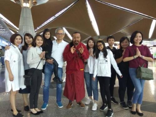 Rinpoche with students in Malaysia